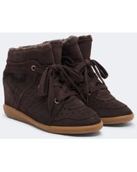 Isabel Marant - Bobby Shearling-Lined Suede Wedge Sneakers - Lyst