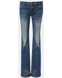 KHAITE - Low-Rise Flared Jeans - Lyst