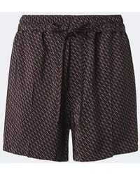 Saint Laurent - Cassandre Printed Silk Shorts - Lyst