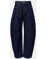 Alaïa - Mid-Rise Barrel-Leg Jeans - Lyst