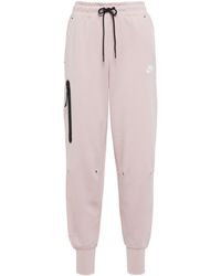 Pink Nike Track pants and sweatpants for Women | Lyst