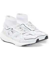 Damen Schuhe Sneaker Niedrig Geschnittene Sneaker adidas By Stella McCartney Gummi Sneakers Ultraboost 22 in Schwarz 