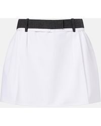 Prada - Pleated Virgin Wool-Trimmed Cotton Miniskirt - Lyst