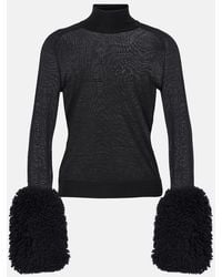 Alaïa - Faux Fur-Trimmed Wool Turtleneck Top - Lyst