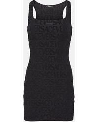 Versace - Vestido corto con Allover - Lyst