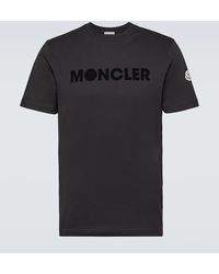 Moncler - T-shirt nera con stampa logo - Lyst