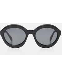 Alaïa - Lettering Logo Round Sunglasses - Lyst
