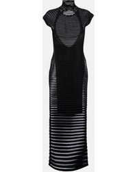 Alaïa - Alaïa robe longue noire à rayures - Lyst