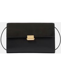 The Row - Laurie Suede And Leather Crossbody Bag - Lyst