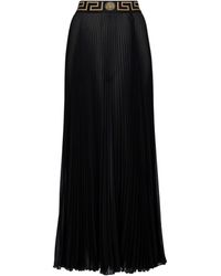 Mujer Ropa de Faldas de Faldas midi Greca-trim maxi skirt de Versace de color Negro 