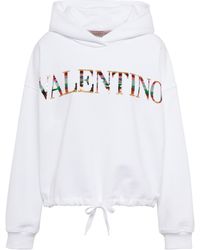 Femme Vêtements Articles de sport et dentraînement Sweats à capuche Hoodie à logo métallisé Coton Valentino en coloris Violet 