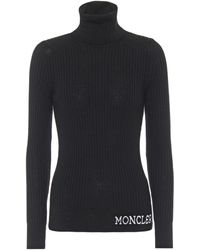 Moncler Pull à col roulé en laine vierge - Noir