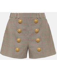 Balmain - Pantalones cortos de lana con botones - Lyst