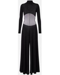 Alaïa - Flared Jumpsuit - Lyst