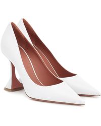 amina muaddi white pump
