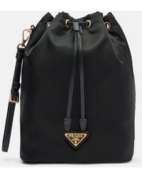 Prada - Re-Nylon Leather-Trimmed Bucket Bag - Lyst