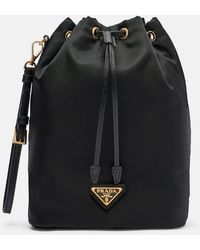Prada - Re-Nylon Leather-Trimmed Bucket Bag - Lyst