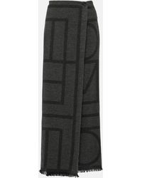 Totême - Logo Embroidered Wool Maxi Skirt - Lyst