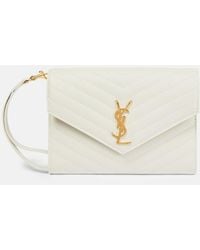Saint Laurent - Portemonnaie mit Kettenriemen Cassandre aus Leder - Lyst