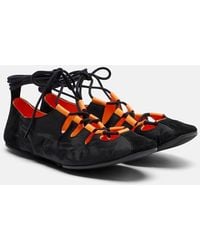 Alaïa - Suede-Trimmed Lace-Up Ballet Flats - Lyst