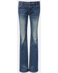 KHAITE - Low-Rise Flared Jeans - Lyst