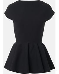 Alaïa - Peplum Top - Lyst