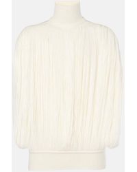 Alaïa - Fringed Wool Turtleneck Sweater - Lyst
