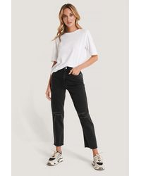NA-KD Versleten Jeans Met Hoge Taille - Zwart