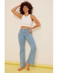 Damen Bekleidung Jeans Bootcut Jeans NA-KD Denim Trend Organische Bootcut Skinny Jeans mit hoher Taille in Grün 