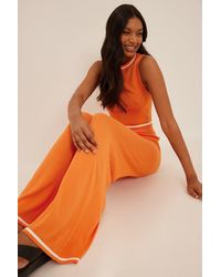 NA-KD Trend Strickhose in Orange Damen Bekleidung Hosen und Chinos Ausgestellte und Palazzo Hosen 