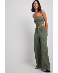 Dames Kleding voor voor Broeken NA-KD Synthetisch Trend Pantalon Met Strikdetail pantalons en chinos voor Broeken met rechte pijp 