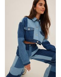 NA-KD Romee Strijd X Organische Cropped Jeans Jack Met Patchwork - Blauw