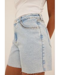 Dames Kleding voor voor Shorts voor Jeans en denim shorts NA-KD Katoen Organische Short Met Hoge Taille En Onafgewerkte Zoom in het Blauw 