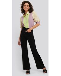 NA-KD Flare Jeans - Zwart