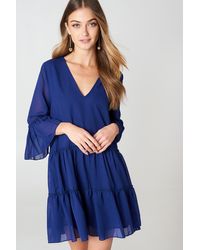 NA-KD Boho V-Neck Ruffle Mini Dress - Blau