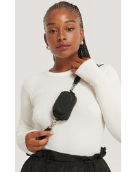 mango black solid handheld bag