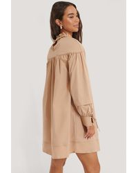 NA-KD Manon Tilstra x Oversize Minikleid - Natur