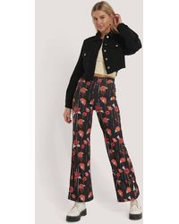 NA-KD Uitlopende Legging - Zwart