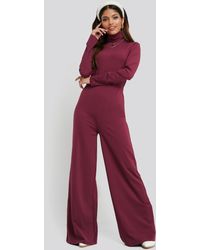 NA-KD Turtle Neck Long Sleeve Jersey Jumpsuit - Roze
