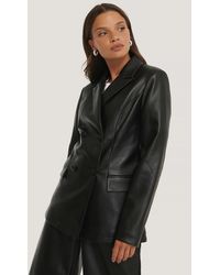NA-KD Dubbelgeknoopte Pu-blazer - Zwart