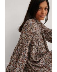 NA-KD Gestructureerde Jurk Met Bloemenprint - Bruin