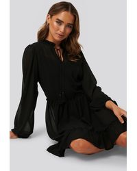 NA-KD Boho Rüschendetail Ls-Minikleid - Schwarz