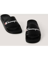 black champion flip flops