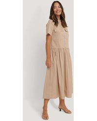 Mode Jurken Mini-jurken Mango casual Mini-jurk bruin-wolwit volledige print casual uitstraling 
