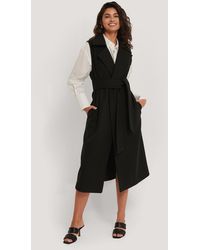 NA-KD Lang Gilet Met Riem - Zwart