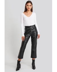 NA-KD Flared Cropped Pu Pants - Zwart