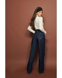 NA-KD Trend Organische Denim-Jeans mit weiten Beinen und hoher Taille - Blau
