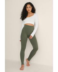 NA-KD - Bella Michlo x Recycelte Leggings mit hoher Taille - Lyst