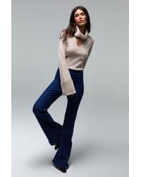 TOP - Nadine Merabi Amber Stone Knit Bodysuit - Lyst