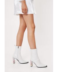 white flat heel boots